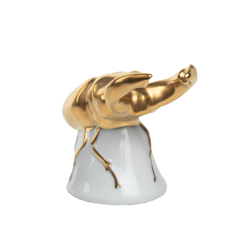 porselein kever goud beeld zij